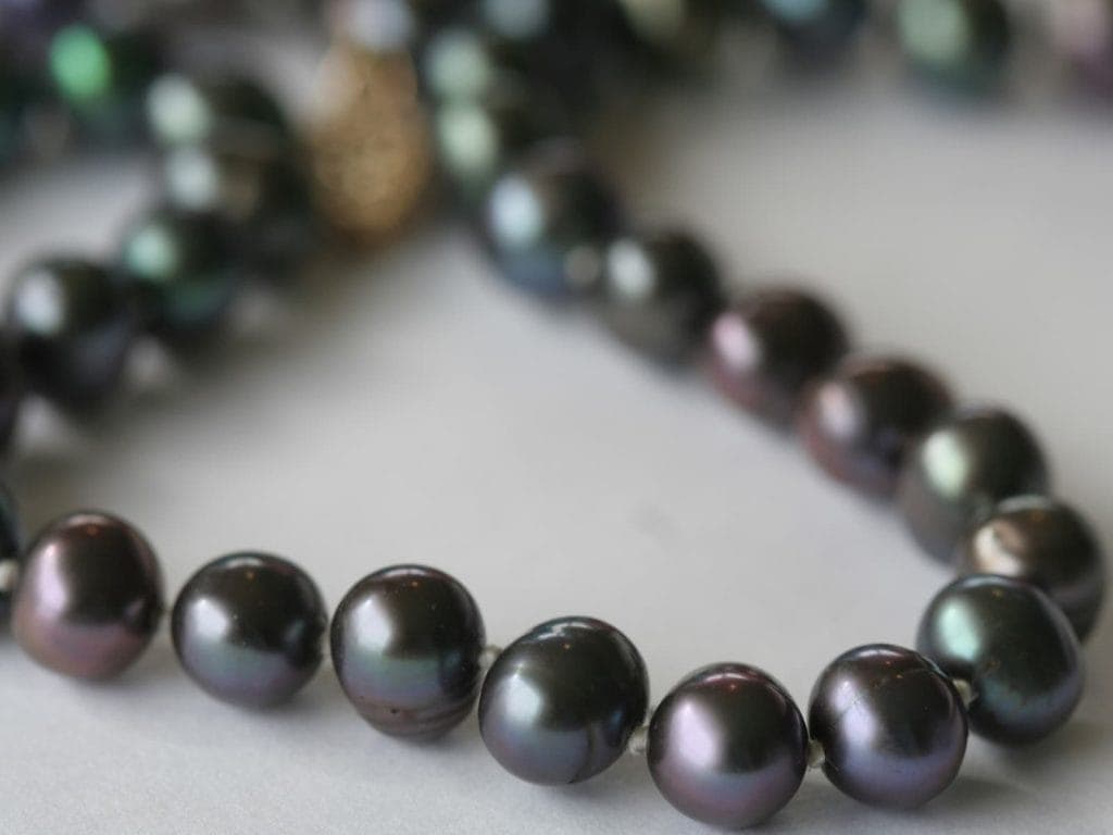 close up of a black pearl necklace