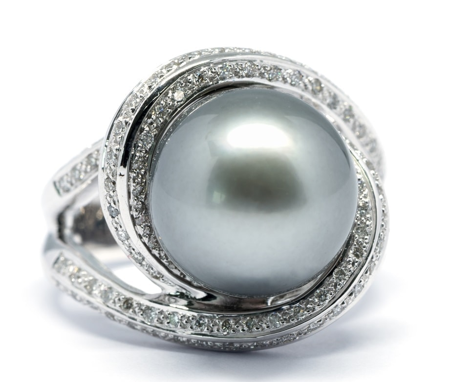 Closed Up Dark Pearl With Diamond And Platinum Ring