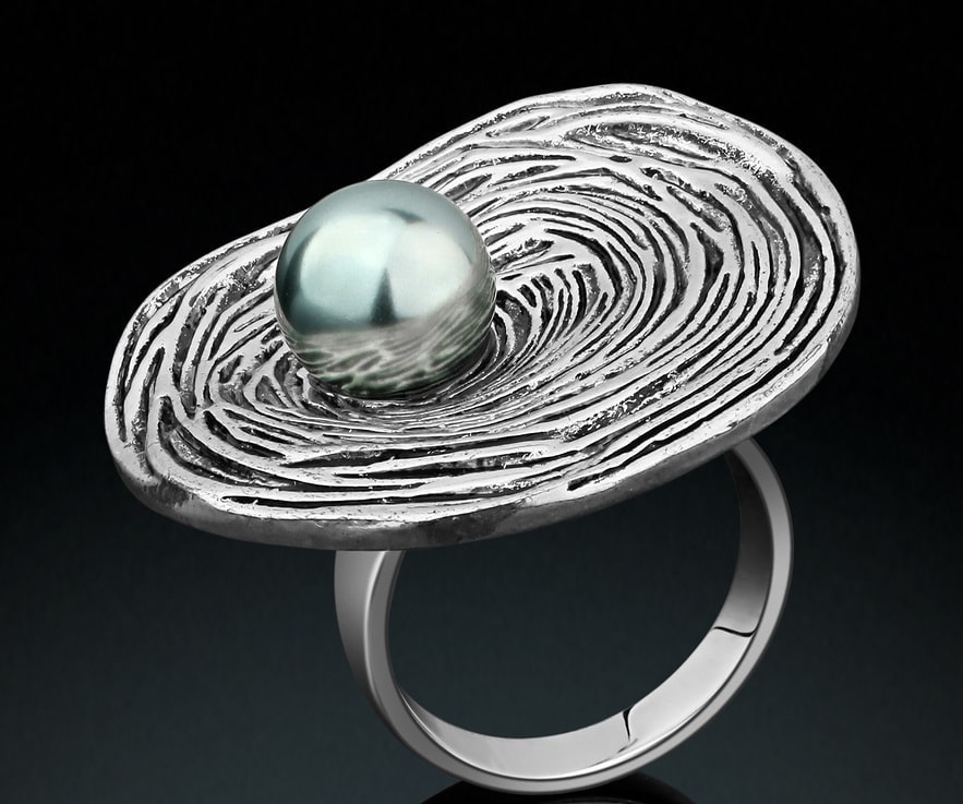 Jewelry Ring With Pearl Isolated On Black