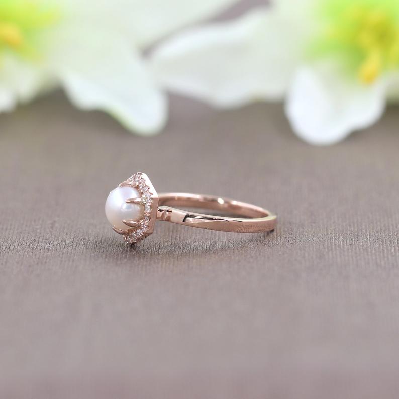 pearl engagement ring in setting