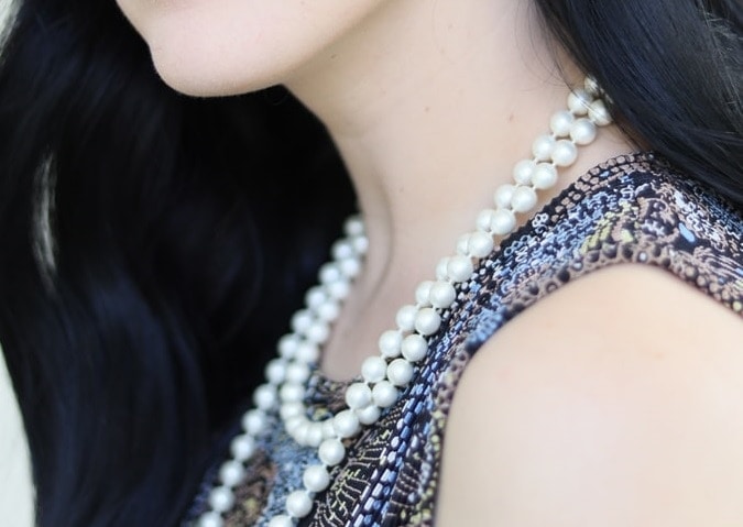 Woman wearing freshwater pearl necklace