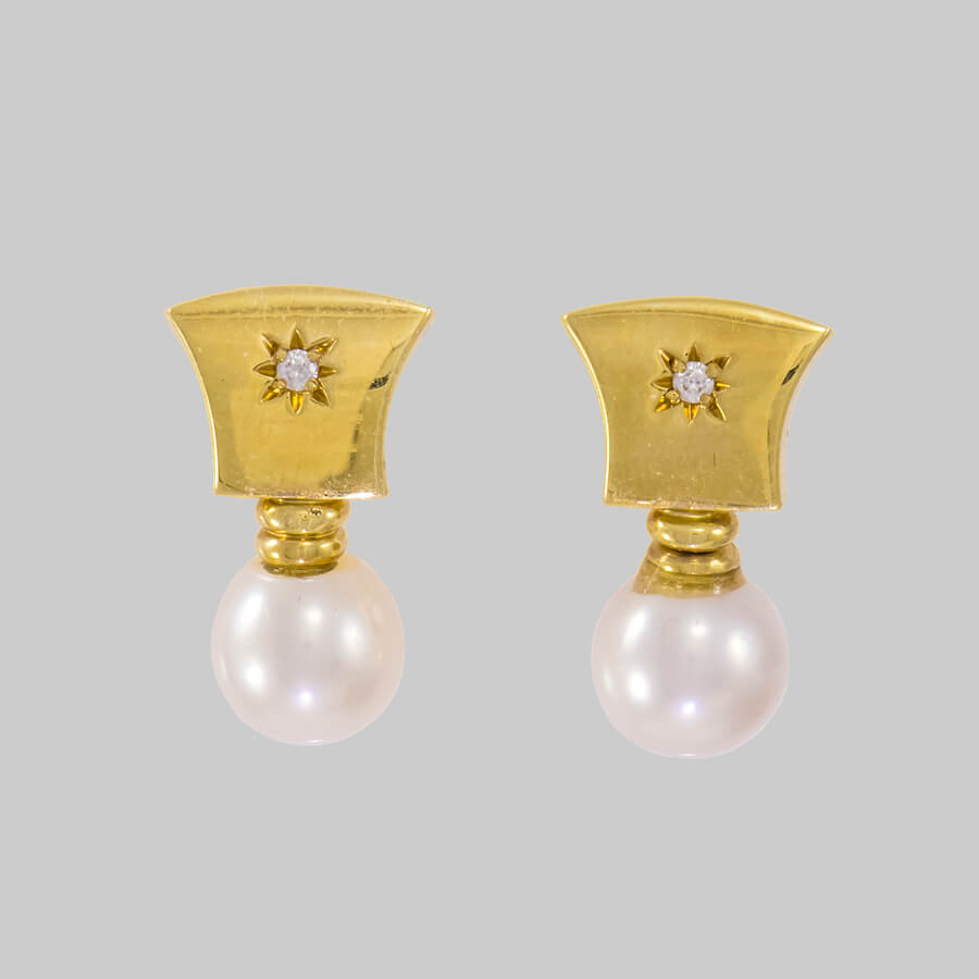 Gold pearl earrings unique design