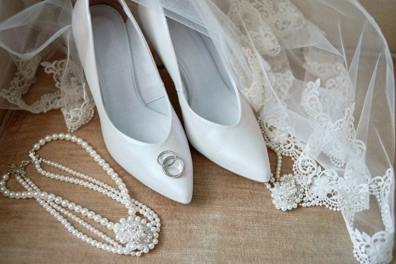 Luxury White Shoes On High Heels, Veil, Golden Wedding Rings And