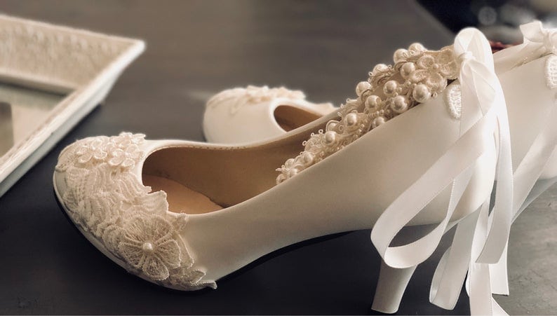 Pearls on bride's shoe