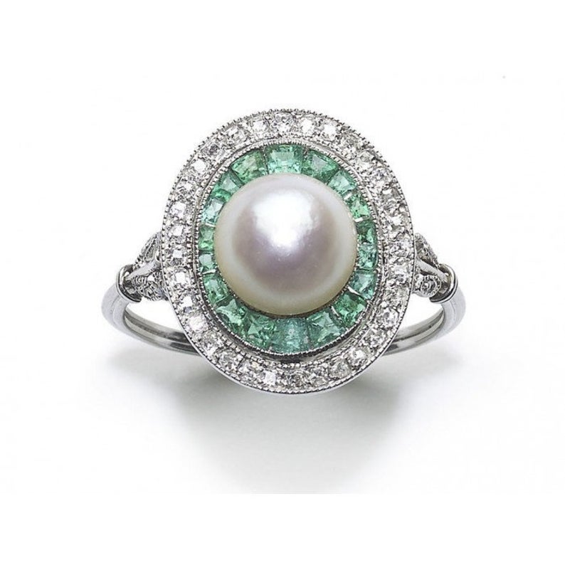 Green emerald and pearl diamond ring