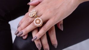 Girl wearing vintage pearl rings