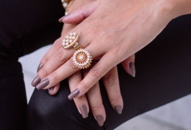 Girl wearing vintage pearl rings